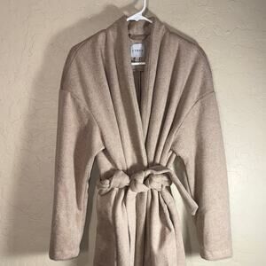 Cyrus knits cream long line belted trench style  size XL. NWOT